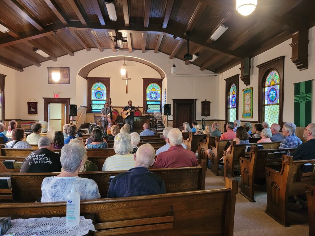 Congregation gathered inside Sand Hill Presbyterian Church sanctuary.